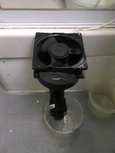 A fan on a timer is attached to the drain pipe allows CO2 to be periodically purged from the chamber.