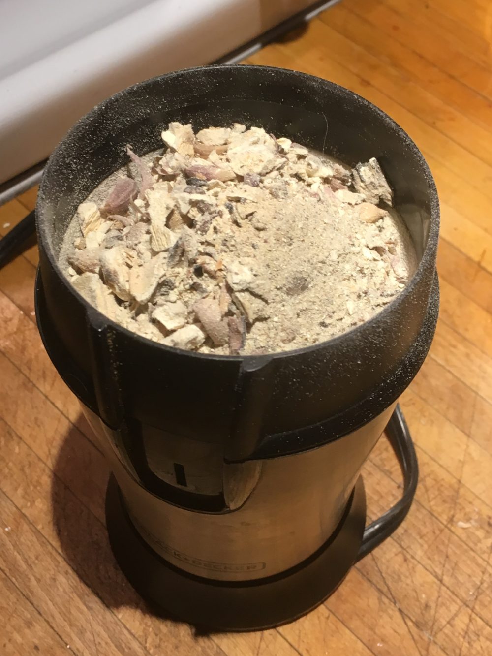 Pulverize in a coffee grinder