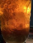 When combined with the clear brown alcohol tincture, the cloudy water decoctions congealed and separated.